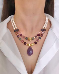 Rainbow Fluorite and Genuine Freshwater Pearl with Amethyst Pendant ✅ NECKLACE FEATURES * Handmade Item: each necklace is meticulously crafted by hand, ensuring quality and uniqueness. * Materials:  8 mm rainbow fluorite high quality natural stone, freshwater pearl, gold-plated dorica, details and chain * Pendant:  amethyst * Length: 43 cm (17 inches) + 5 cm (2 inches) adjustment chain.    -If you require a longer extension chain, please let me know. * Color Discrepancies: Please be aware that c Luxury Handmade Rondelle Crystal Necklaces, Luxury Adjustable Beaded Necklaces With Stones, Luxury Adjustable Gemstone Beads Necklace, Luxury Adjustable Beaded Necklace With Gemstone Beads, Amethyst Pendant Necklace, Fluorite Necklace, Trendy Fashion Accessories, Romantic Anniversary, Amethyst Necklace Pendant