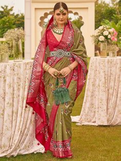 With its stunning green color and beautiful patola printed work, this silk saree is the epitome of elegance and traditional charm. Made from high-quality silk material, this saree offers a luxurious feel and a visually appealing drape. The vibrant green color adds a touch of vibrancy and freshness, making it suitable for various occasions.
The saree can be worn for weddings, festivals, and other special occasions, allowing you to make a stylish statement wherever you go. The traditional look of Green Bohemian Saree For Festive Occasions, Bohemian Green Art Silk Traditional Wear, Green Bohemian Art Silk Traditional Wear, Festive Green Bohemian Saree, Bohemian Green Saree With Pallu Detail, Transitional Green Paithani Silk Saree, Bohemian Green Saree With Traditional Drape, Bohemian Green Saree With Pallu, Green Bohemian Saree With Pallu