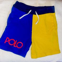 Two Colors Shorts For Little Boy. Great For Summer Fit! Next To Brand New. Sporty Blue Bottoms For Playtime, Fun Blue Playwear Shorts, Playful Yellow Shorts For Spring, Playful Yellow Spring Shorts, Fun Blue Cotton Shorts, Sporty Yellow Color Block Bottoms, Yellow Cotton Playtime Bottoms, Fun Blue Bottoms For Playwear, Playful Blue Bottoms For Playwear