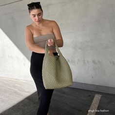 Woven from recycled vegan leather, the Johanna tote bag not only offers plenty of room for all your essential belongings but is also made of 40% post-consumer recycled polyester and 18% post-consumer recycled vegan leather. Making it chic and better for the environment. Recycled Vegan Leather 15"W x 13"H x 5"D Handle Drop: 7.5" Magnetic Closure Removable Zip Pouch Unlined Fits up to an iPad Product No. AB9559MOS Green Bags With Braided Handles For On-the-go, Versatile Hobo Bucket Bag For On-the-go, Eco-friendly Green Shoulder Bag For On-the-go, Trendy Bucket Hobo Bag For On-the-go, Green Hobo Bag With Leather Handles For On-the-go, Modern Everyday Recyclable Bags, Modern Recyclable Bags For Everyday Use, Versatile Bucket Hobo Bag With Braided Handles, Modern Hobo Bag With Braided Handles For Everyday