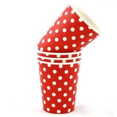 a red and white polka dot paper cup