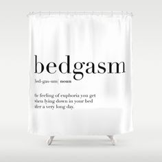 a white shower curtain with the words bedgasm printed in black ink on it