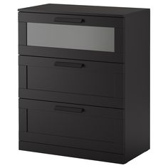 a black filing cabinet with three drawers