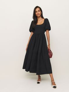 How classic. Shop the Everlyn Dress from Reformation, a midi dress with a scoop neckline, full skirt, and short puff sleeves,. Modest Black Dress, Cashmere Dress, Reformation Dress, Swimwear Dress, Genetically Modified, Vintage Inspired Dresses, Black Wedding Dresses, Midi Length Dress, Maxi Dress Blue