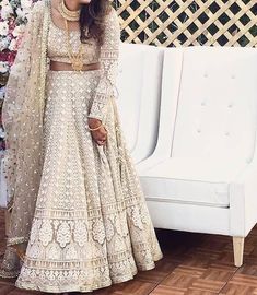 "Ivory dyeable Pure Georgette lehenga with very heavy and intricate chikankari shadow &  embroidery, embellished with badla work allover. Pallu and body fully embroidered. Blouse has embroidered sleeves.  It comes with Stitched Lehenga with Inner Lining and can-can (optional), Stitched blouse and Dupatta. Dupatta is on net material, it can be customized and dupatta materia and design can be different, depends on the availability of the material at the time.  The lehenga can be customised according to requirements. Hand embroidered items may have some loose threads. We have only one in stock so grab it now.  The lehenga can be dyed in any color, you can send a picture of color you want.  Material : Pure Georgette Work : Chikankari, badla and Handwork Care : Dry clean  Lehenga is custom-made Anarkali Style Sharara With Lace Work For Reception, Off White Anarkali Gown With Intricate Embroidery, Off-white Anarkali Gown With Intricate Embroidery, Chikankari Embroidered Gown For Reception And Festivals, Chikankari Embroidery Gown For Reception And Festivals, Anarkali Gown With Lace Work And Semi-stitched Fit, Festivals Gown With Chikankari Embroidery For Reception, Anarkali Gown With Lace Work, Anarkali Lehenga With Lace Work