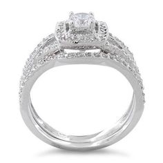 Top of ring height: 8.44mm

Top of ring width: 8.4mm

Band width: 3.3mm

Shank width: 2.2mm


Stone material: clear cubic zirconia

Center stone size: 4mm

Stone shape: round

Center stone carat weight: 0.3 ct.

Total number of CZ stones: 80

Stone setting: Prong setting


Metal: 925 sterling silver

Plating: rhodium plated

Finish: high polish Dazzling Bridal Sets With Center Stone For Promise Ring, Cubic Zirconia Princess Cut Ring With Halo Setting, Halo Princess Cut Cubic Zirconia Wedding Ring, Cubic Zirconia Halo Ring For Wedding With Round Band, Cubic Zirconia Halo Ring For Wedding, Wedding Halo Ring With Cubic Zirconia, Cubic Zirconia Bridal Set With Princess Cut Center Stone, Wedding Halo Ring With Brilliant Cut Cubic Zirconia, Cubic Zirconia Bridal Set With Princess Cut