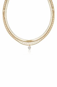 Instantly create a trend-right layered effect with this gold-plated multistrand necklace accented with a single sparkling stone. 16" longest strand length; 14" shortest strand length:5" extender 1/4" pendant diameter Lobster clasp closure 18k-gold plate/cubic zirconia Imported Layered Chain Necklace, Layered Chain, Layered Chains, Multi Strand Necklace, Keep Jewelry, Chain Pendant, Multi Strand, Chain Pendants, Lobster Clasp