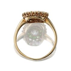 Antique Diamond and Demantoid Garnet Cluster Ring The Greer ring is an authentic vintage diamond and demantoid garnet cluster ring from the Edwardian Era circa 1900. The ring centers an approximately 0.25-carat Old European Cut diamond of approximately I-J color, VS clarity. Surrounding the center stone are 10 demantoi The Edwardian Era, Australian Sapphire, Demantoid Garnet, Granny Smith, Edwardian Era, European Cut Diamonds, Antique Diamond, Spring Green, Vintage Diamond