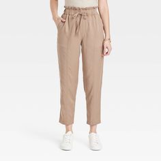 Move through casual days in effortless style and comfort with these High-Rise Tapered Ankle Pull-On Joggers from A New Day™. Fashioned in a tapered leg silhouette, the ankle-length twill joggers bring relaxed style to your look. The functional drawstring on the elastic waist lets you get the perfect fit with every wear, and the functional pockets offer a handy spot for stashing on-the-go essentials. A New Day™: Style that goes wherever you do. Bottom Clothes, Pull On Pants, Relaxed Style, A New Day, Bottoms Pants, Ankle Length, Effortless Style, New Day, Elastic Waist