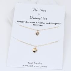 "14K Solid Gold Mother Daughter Necklace Set This necklace set is a nice gift for a mother and daughters. These necklaces will arrive in a nice gift box. If you prefer the necklaces be shipped in an individual box, please let me know. Mother necklace: The heart charm is 14K gold, it is about 13.5mm x 7.5mm The necklace is 14k gold 18\" Daughter necklace: The heart charm is 14K gold, it is about 11mm x 6mm. The necklace is 14k gold 16\" Please read our policy before you place your order. https:// Elegant Necklace For Father's Day Gift, Elegant Father's Day Gift Necklace, 14k Rose Gold Heart Necklace For Mother's Day, Elegant Necklaces With Gift Box For Father's Day, Gold Necklace With Gift Box For Anniversary, Gold Jewelry With Gift Box For Anniversary, Heart-shaped Jewelry For Mother's Day With Gift Box, Heart-shaped Jewelry For Mother's Day In Gift Box, Heart-shaped Jewelry In Gift Box For Mother's Day