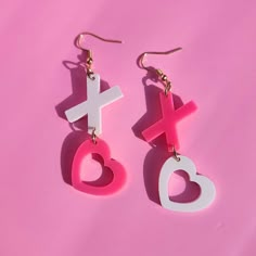 These adorable earrings are super lightweight and fun! They are laser cut from acrylic and then assembled. Earring hooks are hypoallergenic. Fun White Earrings For Valentine's Day, Kandi Jewelry, Valentines Day Earrings, Glowforge Projects, Earring Inspo, Rave Accessories, 3d Printed Jewelry, Valentines Earrings, Laser Cut Jewelry