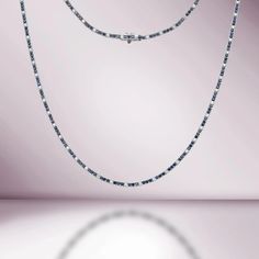 Beautiful Diamond Tennis Necklace. A staple in your jewelry collection. Handmade in New York City of polished 14k white gold. This tennis necklace showcases a delicate 4 prongs in line chain embellished with dozens of shimmering white natural earth mine diamonds ( NO Lab Made) and Pink Sapphires. Quality to us is impor Blue Diamond Cut Fine Jewelry Necklace, Blue Diamond Cut Necklace In Fine Jewelry Style, Luxury Blue Diamond Cut Necklace, Classic Blue Diamond Necklace With Diamond Cut, Blue Diamond Necklace With Single Cut Diamonds, Classic Blue Diamond Cut Diamond Necklace, Classic Blue Diamond Necklace With Accents, Classic Blue Diamond Cut Necklace, Sapphire Diamond Cut Necklace