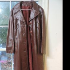 Vintage, Leather Trench Coat From 60s Or 70s. There Is No Brand Anywhere That We Can Find On This Jacket, But Is Very Intricate And Almost Looks Tailored. Stitching Is Very Tight. Used In Fair Condition. Women's Size Small. Measures 45" Tall Or Long And 17 1/8" Wide From Shoulder Seam To Shoulder Seam. Red, Reddish-Brown Color. Has A Tie Around Belt. Please Be Sure Of Your Size And Application As There Are No Returns. Keywords: Biker Buel Motorcycle Motor Cycle Matrix Mod Hipster Tailor Vintage Red Leather Outerwear, Retro Formal Fall Outerwear, Retro Leather Outerwear For Formal Occasions, Retro Leather Jacket For Formal Occasions In Fall, Red Vintage Leather Jacket, Vintage Leather Trench Coat, Motor Cycle, Leather Trench, Leather Trench Coat