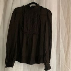 In Very Good Condition. New Never Worn. Brown 100% Silk Long Sleeve Ruffle Trimmed With Covered Square Rhinestones Bust And Back Detail Brown Georgette Blouse. Measures 21” Wide Armpit To Armpit 19” Wide Waist 26” Long Length And 27” Long Sleeve Length Lace Top For Workwear In Fall, Long Sleeve Lace Blouse For Work, Fall Workwear Blouse With Lace Trim, Fall Blouse With Lace Top For Layering, Fall Lace Top Blouse For Layering, Long Sleeve Tops With Lace Trim For Work, Elegant Brown Tops For Daywear, Fall Daywear Blouse With Lace Trim, Fall Lace Trim Blouse For Daywear