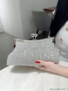 BagForLove - Elegant Rhinestone-Embellished Square Bag: Ideal Bridal Clutch for Weddings, Proms & Parties Product Description Color Silver Pattern Type Plain Bag Size Small Type Ruched Bag Material Glass Size Chart INCH CM Bag Height Bag Length Bag Width Strap Length 4.7 inch 9.4 inch 1.2 inch 47.2 inch Bag Height Bag Length Bag Width Strap Length 12 cm 24 cm 3 cm 120 cm Details Pictures Similar Products h2 { text-align: center; } /* æ¢è¡ */ li{ white-space: normal; word-break: break-all; word-wrap: break-word; } .red-box { width: 100%; display: flex; flex-direction: row; flex-wrap: wrap; justify-content: center; } .red-box > div { width: 190px; height: 250px; margin: 10px; } .red-box > div > a > img { width: 190px; height: 250px; } .size-box { width: 100%; margin: auto; white-space: now Prom Evening Bag Embellished With Crystals, Crystal Embellished Evening Bag For Prom, Embellished Crystal Evening Bag For Prom, Prom Crystal Evening Bag Embellished, Glamorous Bedazzled Evening Bag For Wedding, Glamorous Sparkling Clutch For Weddings, Rhinestone Embellished Bags For Banquet, Rhinestone Bags For Banquet, Crystal Clutch With Rhinestones