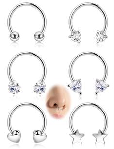 six pairs of nose rings with stars and crystal stones