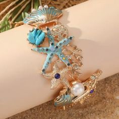 Ocean Beach Shell Wrist Or Ankle Bracelet. New Adjustable. Made With: Alloy, Rhinestones, Pearls. Toggle Clasp. Size: 8.25 Inches In Length. Summer Metal Beaded Bracelets, Summer Beaded Metal Bracelets, Beachy Jewelry For Beach Party, Summer Vacation Beach Jewelry, Trendy Metal Bracelets For Beach, Strand Jewelry For Beach Party, Shell Jewelry For Beach Party And Season, Trendy Turquoise Jewelry For Vacation, Beachy Summer Bracelet Jewelry