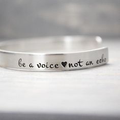 This charming sterling silver Be a Voice, Not an Echo cuff is the perfect inspirational gift for anyone. Features & Measurements:➹ 14 Gauge Sterling Silver ➹ 1/4" Wide x 6" Long ➹ Hand Stamped ➹ Easily Adjustable Penny Crafts, Metal Stamping Kit, Impress Art, Metal Stamping Diy, Stamping Metal, Stamping Jewelry, Stamp Jewelry, Jewelry Stamping, Hand Stamped Cuff Bracelet