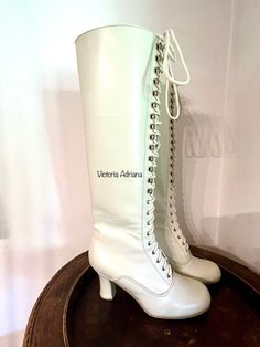 Vintage Faux Leather Boots With Round Toe, Vintage Faux Leather Round Toe Boots, Vintage Faux Leather Boots With Closed Toe, Vintage Faux Leather Closed Toe Boots, Retro Leather Knee-high Boots With Round Toe, White Lace-up Vintage Boots, Vintage White Lace-up Boots, Costumes Design, Retro Boots