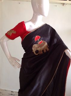 "Stylish black semi silk saree with intricate elephant hand embroidery and raw silk unstiched blouse in red with matching elephant embroidery at the sleeves. This is a unique one of a kind piece and the zardosi work is truly beautiful. Saree length 5.5 meters Blouse fabric 1 meter 44\" wide Saree is custom made and ships out in 2 weeks time.Shipping time is 4-5 days with tracking. We also offer blouse and petticoat stitching for saree as additional services. Please convo me if you need help or h Black Silk Embroidered Saree, Black Embroidered Silk Saree, Black Art Silk Blouse Piece With Resham Embroidery, Black Silk Traditional Wear Embroidered, Black Embroidered Art Silk Saree, Black Embroidered Art Silk Blouse Piece, Black Embroidered Tussar Silk Traditional Wear, Black Raw Silk Saree Blouse Piece, Embroidered Black Tussar Silk Traditional Wear