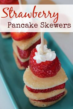 strawberry pancake skewers on a blue plate