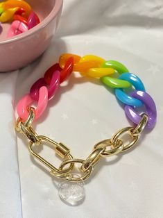 "🌈 Rainbow Bracelet 💫 If you like to add colors to your life this rainbow chain bracelet is a wonderful and unique option.  It'll be also a very special gift or if you want to look awesome wearing a piece that will brighten up your accessories selection and make you get many compliments. I T E M ~D E T A I L S Materials: Colorful plastic chain, gold plated chain, gold plated link clasp.  Thank you for visiting my product. You can see more amazing designs on my shop clicking here: https://www.e Trendy Adjustable Multicolor Chain Bracelet, Trendy Multicolor Adjustable Chain Bracelet, Multicolor Adjustable Chain Jewelry For Friendship, Multicolor Adjustable Chain Bracelet, Trendy Pink Chain Bracelet With Adjustable Chain, Trendy Multicolor Chain Bracelet For Gift, Trendy Pink Adjustable Chain Bracelet, Trendy Multicolor Charm Bracelet, Multicolor Chain Bracelets As Gift