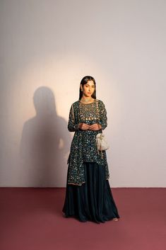 Featuring a royal green printed & embroidered sharara set in viscose georgette base with  saadi, cutdana, mirror, kasab and sequin hand embroidery. It is paired with embroidered viscose glass organza kali sharara and viscose georgette dupatta. Traditional Sharara With Sequins And Straight Kurta, Green Sharara With Straight Kurta For Reception, Eid Sequin Sharara With Straight Kurta, Traditional Sequined Palazzo Set For Eid, Eid Sharara With Sequins, Georgette Sequin Straight Kurta Set, Green Chinon Palazzo Set With Mirror Work, Green Chinon Palazzo Set For Reception, Diwali Sequin Georgette Palazzo Set