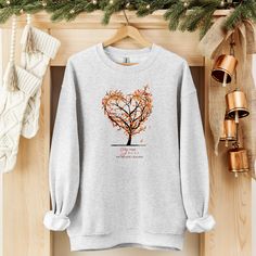 �✝️Wrap yourself in warmth and faith with our “Fall for Jesus, He Never Leaves” Cozy Sweatshirt! 🍂💛 Featuring a heart-shaped tree with fall leaves gently blowing in the wind, this sweatshirt beautifully combines the cozy spirit of the season with a message that inspires. Perfect for crisp autumn days, the soft fabric keeps you snug while reminding you that Jesus’ love is ever-present, no matter the season. Fall for the comfort, stay for the message—this is the ultimate faith-filled, fall wardro Fall For Jesus, Blowing In The Wind, Jesus Love, Fall Wardrobe Essentials, Crisp Autumn, Autumn Days, Cozy Sweatshirts, Fall Leaves, Autumn Day