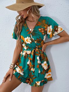 This boho Floral Print Butterfly Sleeve Romper is ideal for any event, whether you're going to a festival or just spending the day with friends or at a beach party. This dress with a chirpy floral design is a necessity for any fashion-forward woman because of the exquisite design and attention to detail, as well as the lightweight fabric that keeps you cool and comfortable. Features: Style: Boho Pattern Type: Floral Details: Belted, Wrap, Ruffle Hem Length: Short Type: Shirt Fit Type: Regular Fit Neckline: V neck Sleeve Length: Short Sleeve Sleeve Type: Butterfly Sleeve Waist Line: High Waist Fabric: Non-Stretch Material: Woven Fabric Composition: 95% Polyester, 5% Elastane Care Instructions: Machine wash or professional dry clean Body: Unlined Belt: Yes Size Chart (cm): Size Belt Length B