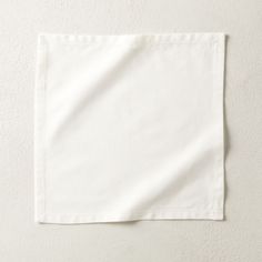 a white napkin hanging on the wall