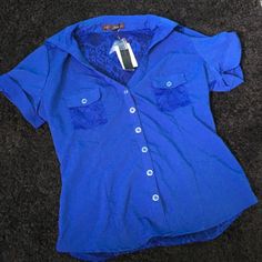 Royal Blue Short Sleeve Button Up Collared Blouse Featuring A Completely Lace Back And Lace Detailing On The Front Pockets. Sizing Is In Juniors. Brand Is Heartsoul From Kohl’s, Completely New With Tags! Bought This To Wear To Work But It Didn’t Fit. Very Lightweight And Cute! Blue Buttoned Blouse For Summer, Summer Blue Blouse With Buttons, Blue Casual Blouse With Buttons, Casual Blue Blouse With Buttons, Casual Blue Buttoned Blouse, Blue Button-up Tops With Buttons, Blue Short Sleeve Blouse With Button Closure, Blue Short Sleeve Top With Snap Buttons, Blue Short Sleeve Tops With Snap Buttons