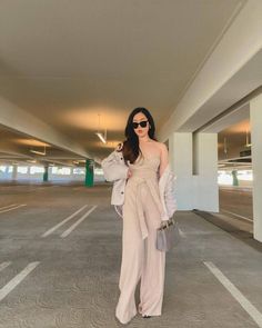 Aimee is the stylish wardrobe addition you need. Perfect for dressing up or down, so versatile. Made from luxe beige fabric and features in-built cups, waist tie & flared leg pants. • 95% Cotton 5% Spandex.• Stretchy. Chic Spring Pantsuit With Tie Waist, Elegant Beige Jumpsuits And Rompers For Day Out, Chic Beige Wide-leg Pantsuit, Chic Beige Jumpsuits And Rompers For Spring, Elegant Beige Jumpsuits And Rompers For Night Out, Chic Beige Jumpsuits And Rompers For Day Out, Chic Spring Belted Pantsuit, Elegant Beige Jumpsuits And Rompers For Date Night, Chic Wide Leg Jumpsuits For Day Out