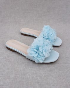 "Classic slide flat sandals for casual and dressy look with added chiffon flowers all over. Simple and easy wear for brides, bridesmaids and/ or wedding parties. DETAILS: COLORS AVAILABLE: Ivory, Light Blue, White, Pink, and Champagne UPPER: Synthetic upper and lining MATERIALS: Mandmade outsole STYLE NAME: EVELYN Not sure of which size to purchase? Shoes measurements are as follow: (Please note measurements taken the length of inside of shoe from toe to heel) Size 5.5 - 9.25\" Size 6 - 9.40\" S Bridesmaids Sandals, Bridesmaid Sandals, Shoes Editorial, Off White Shop, Flowers Simple, Flower Girl Shoes, Bridal Flats, Satin Shoes, Bridal Sandals