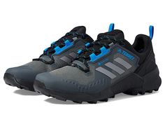 adidas Outdoor Terrex Swift R3 GORE-TEX(r) Hiking Shoes - Men's Shoes : Black/Grey/Blue Rush : The adidas Outdoor Terrex Swift R3 GORE-TEX Hiking Shoes with a waterproof GORE-TEX membrane combine the lightweight design and cushioning of a trail running shoe with the versatility and stability of a hiking boot. Traditional lace-up closure for a secure fit. GORE-TEX textile upper. Water-resistant and breathable. Lightstrike EVA midsole. Textile lining and molded sockliner. Continental Rubber outsol Functional Adidas Lace-up Trail Running Shoes, Adidas Functional Trail Running Shoes, Adidas Functional Running Shoes For Outdoor, Adidas Low-top Trail Running Shoes For Hiking, Functional Adidas Running Shoes For Hiking, Functional Adidas Hiking Running Shoes, Sporty Impact-resistant Hiking Boots For Sports, Sporty Impact-resistant Hiking Boots, Sporty Impact Resistant Hiking Boots For Sports