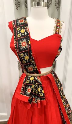 ❤️Attractive Chaniya Choli cotton for teens/Adults ❤️ Simple Sober Elegant Navratri dandiya dress cotton Chaniya Choli in bright red and patola print combo with trendy blouse with sea shell embellishments size 38 blouse: 38 plus 3 in margin. Length of lehanga: 42 inches Waist size lehanga: 32-34 inches Color scheme: red/dark green/black Please let us know if you have any questions prior or to order. We try to ship ASAP from North Carolina. Red Chaniya Choli For Navratri, Traditional Fitted Pre-draped Saree For Navratri, Bohemian Fitted Lehenga With Bandhani Print, Fitted Bohemian Lehenga With Bandhani Print, Fitted Bohemian Bandhani Print Lehenga, Festive Floor-length Cotton Dupatta, Bohemian Pre-draped Saree For Navratri, Semi-stitched Bandhani Print Choli For Festive Occasions, Cotton Floor-length Sharara For Festivals