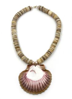 Natural Heishi Beaded Necklace with Clam Seashell Charm and Pearl details. Elevate your beachy look with our Serena Necklace. Featuring handcrafted natural heishi beads and a charming clam seashell and pearl pendant, this necklace is the epitome of luxury coastal fashion. Luxury Coastal, Coastal Fashion, Shark Tooth Necklace, Pearl Details, Tooth Necklace, Jewelry Workshop, Heishi Beads, Fine Jewellery Earrings, Pearl Pendant