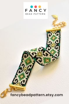 the beaded bracelet is made with green and white beads, gold tone chain and clasp