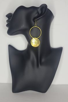 These earrings are hand crafted from brass material, which makes them a show stopper in the way they catch the light. They are bond to add some excitement to any outfit. Get a pair for yourself or as a gift to someone you love for special occasion or just because.  Details: - hand made - light weight - materials : brass - hook closure - clear rubber stopper Bohemian Brass Jewelry For Party, Circular Brass Jewelry For Gifts, Bronze Circle Shaped Metal Jewelry, Bronze Circular Metal Jewelry, Brass Clip-on Earrings For Party, Party Brass Clip-on Earrings, Handmade Metal Chandelier Earrings For Wedding, Handmade Adjustable Earrings For Party, Handmade Brass Chandelier Drop Earrings