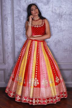 Multi colored lehenga in raw silk base with cutdana, zardozi and pearl floral embroidery. Comes with mulmul embroidered blouse and dupatta.
Component: 3
Pattern: Embroidered
Type Of Work: Zardozi, Pearls, Cutdana Floral Motifs
Neckline: U-Neck
Sleeve Type: Sleeveless
Fabric: Raw Silk, Mulmul
Color: Multi Color
Other Details: 
Sheer dupatta with tassel hem
Occasion: Destination Wedding - Aza Fashions Anarkali Lehenga With Multicolor Embroidery And Meenakari, Anarkali Lehenga With Meenakari Embroidery, Navratri Meenakari Choli In Raw Silk, Festive Meenakari Choli In Raw Silk, Festive Lehenga With Multicolor Embroidery And Gota Work, Festive Meenakari Raw Silk Lehenga, Navratri Meenakari Embroidered Lehenga, Festive Raw Silk Lehenga With Meenakari, Multicolor Embroidered Lehenga With Meenakari For Diwali