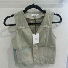 Nwt Re/Done Cropped Denim Vest Size Small Supposed To Look Faded Button Down W/Pockets Definitely Tight Fit If Closed Trendy Cotton Denim Vest With Snap Buttons, Dark Wash Denim Vest With Pockets For Day Out, Fall Utility Jeans With Buttons, Utility Jeans With Buttons For Fall, Cropped Denim Top For Spring Workwear, Button-up Denim Vest For Work With Pockets, Spring Cotton Denim Vest With Snap Buttons, Spring Cotton Denim Vest With Button Closure, Trendy Button-up Denim Vest With Snap Buttons