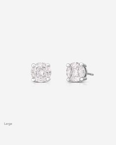 A sparkling cluster of marquise and princess-cut diamonds gives these studs the illusion of a generous round diamond earring. Available in 4 sizes, these are the perfect wear-forever style that offers maximum impact. White Diamond Earrings With Marquise Cut And Prong Setting, White Marquise Cut Diamond Earrings, Classic Diamond Earrings With Diamond Eyes For Formal Occasions, Diamond White Marquise Brilliant Cut Diamond Earrings, Brilliant Cut Marquise Diamond Earrings In Diamond White, Marquise Brilliant Cut Diamond White Diamond Earrings, White Marquise Cut Diamond Earrings With Accents, Brilliant Cut Marquise Diamond White Earrings, Brilliant-cut Marquise Diamond White Earrings