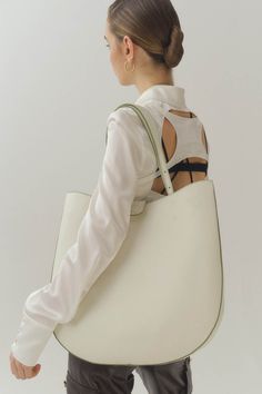 Matt white calfskin large saddle bag Olive contrast threading & edging details. Fold-over flap with magnetic closure. Embossed logo. Adjustable leather straps suitable for both side-shoulder carrying and crossbody carrying. -------------- Bag size: approx. 16”W x 18”H x 3.5”D (35.5cm x 39.5cm x 8cm). Adjustable leather straps drop: approx. 8.5" to 18" (22cm to 46cm). -------------- Free shipping within the US. $15 for all shipping outside of the US. Return & Exchange acceptable within 5 business White Double Handle Shoulder Bag For Work, White Bags With Long Strap For Everyday Use, White Crossbody Bag With Long Strap, White Soft Leather Shoulder Bag For Office, Chic White Shoulder Bag With Leather Lining, White Bag With Adjustable Strap For Work, White Shoulder Bag With Long Strap For Everyday, White Shoulder Bag With Detachable Strap For Work, White Shoulder Bag For Work