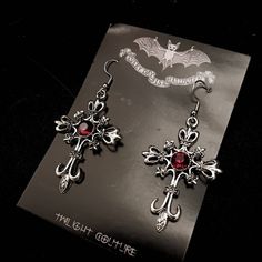 Lady Vamp earrings  Simple new silver Cross with central blood red gem. Perfect for vampire vibes.,  sturdy earring with stainless steel hook Handmade to order. Ready in 3-5 days. May take longer during busy times Accessories Alt, Vampire Accessories, Alt Jewelry, Vampire Vibes, Jewelry Alternative, Vampire Earrings, Vampire Clothes, Vampire Girl, Vampire Halloween