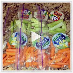 carrots and celery wrapped in plastic on a counter