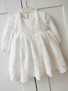 ♡ MADE OF: Ecru delicate fabric with ecru embroidered lace. The lining is made of 100% cotton. ♡ Processing time: 7-10 business days ♡ CARE INSTRUCTIONS: Wash in cold or warm water (30oC/ 65 - 85F). Do not use bleach. Dry at low temperatures, do not use machine drying. Iron at medium or low temperature. Hand wash and hang dry for longer wear. Lace Princess Dress With Ruffles For First Communion, Long Sleeve Baptism Dress With Ruffles, Cream Baptism Dress With Lace Bodice, First Communion Lace Patchwork Dress For Spring, Spring First Communion Dress With Lace Patchwork, First Communion Spring Dress With Lace Patchwork, First Communion Spring Dress With Lace Trim, Lace Patchwork Dress For Baptism, Fitted Cream Princess Dress With Lace Trim