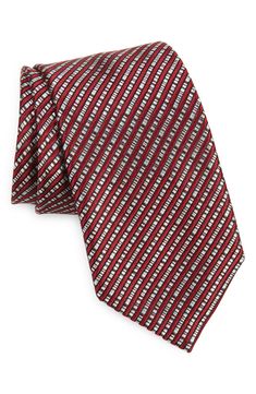 Angled stripes woven in subtly mixed colors distinguish a tie crafted from polished silk jacquard and styled to elevate any formal look. 100% silk Dry clean Made in Italy Elegant Standard Tie With Vertical Stripes, Red Silk Ties For Business, Red Silk Tie For Business, Elegant Formal Suit And Tie Accessories With Vertical Stripes, Elegant Business Ties With Vertical Stripes, Elegant Striped Ties For Office, Elegant Striped Suit Accessories For Workwear, Red Elegant Suit And Tie Accessories For Workwear, Formal Red Silk Tie