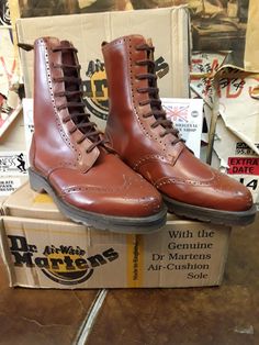 These are a rather unique pair of brogue boots. 9 holes in height they are a Dr Martens version.  These were Made in England back in the day. They are brand new apart from a scuff on the left foot. Refer to photos.  They are a Tan colour that's very classi  for this style of boot. They are leather lined and have a cushioned sole. They are a UK size 8, European 42,mens USA 9 Brogue Boots, Mens Shoes Boots, Dr. Martens Boots, Tan Color, Dr. Martens, Boots Men, Electric Blue, Combat Boots, Shoes Mens