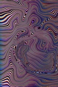 an abstract background with wavy lines in blue, purple and pink colors that appear to be distorted