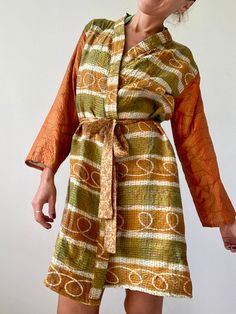 Beautiful silk mini jacket, very light to wear with visible stiching  Boho style with open front, and ethnic prints It is actually reversible and can be worn on bot sides  MEASURE Free size  Length 37" MATERIAL * kantha stitched silk  Thank you for looking Vintage Long Sleeve Kimono With Patchwork, Vintage Long Sleeve Patchwork Kimono, Vintage Long Patchwork Outerwear, Vintage Long Outerwear With Patchwork, Multicolor Vintage Kimono For Fall, Vintage Multicolor Fall Kimono, Long Patchwork Summer Outerwear, Summer Long Patchwork Outerwear, Brown Long Patchwork Outerwear