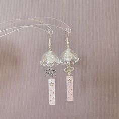 Elevate your style with these handmade earrings - an ideal blend of culture, craftsmanship, and elegance. They're perfect for any occasion!  🤍 Made with high-quality hand crafted wind chime style glass charms, adorned with glass crystal beads and resin pendants (light pink or white), they are absolutely eye catching jewelleries!  🤍Finish with silver plated nickel-free hypoallergenic earring hooks. These earrings not only look gorgeous but also prioritize comfort. 🤍Size: - Approx. 8cm in lengt White Dangle Crystal Earrings Gift, Sterling Silver Dangle Flower Earrings For Gifts, Delicate White Crystal Earrings For Gift, White Sterling Silver Dangle Flower Earrings, White Crystal Pierced Earrings As Gift, White Pierced Crystal Earrings As Gift, White Pierced Crystal Earrings For Gifts, Clear Drop Earrings For Anniversary, White Crystal Earrings As Gift